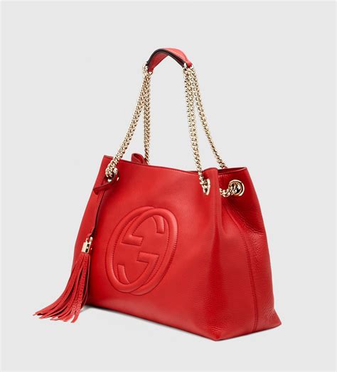 gucci red silppers|Gucci leather shoulder bag.